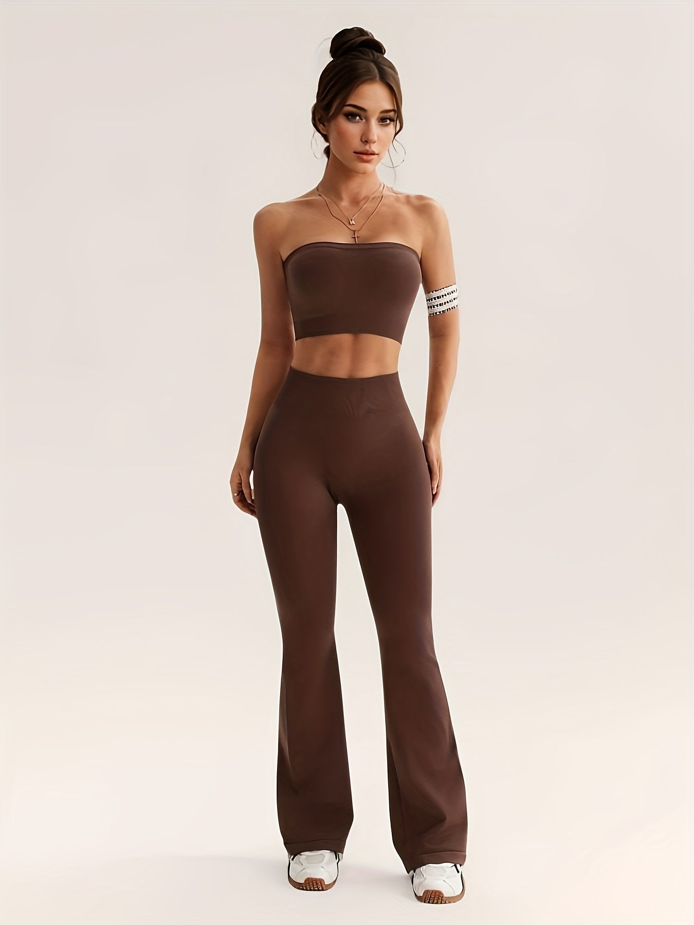 Conjunto Esportivo Top sem Alça e Calça Flare Modern Nayara