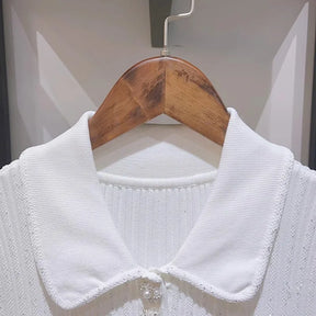 Vestido Curto Tricô Gola Polo e Bolsos Modern Seraphina